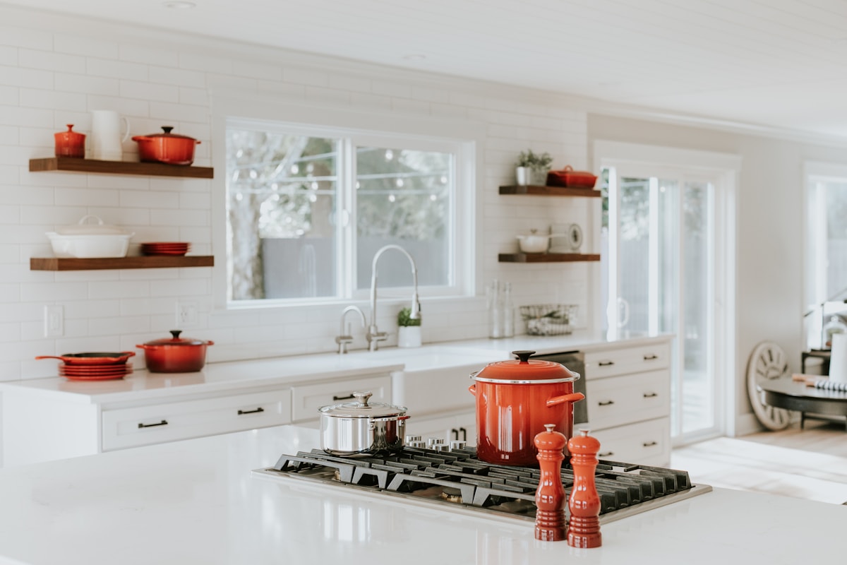 young adult making espresso apartment kitchen