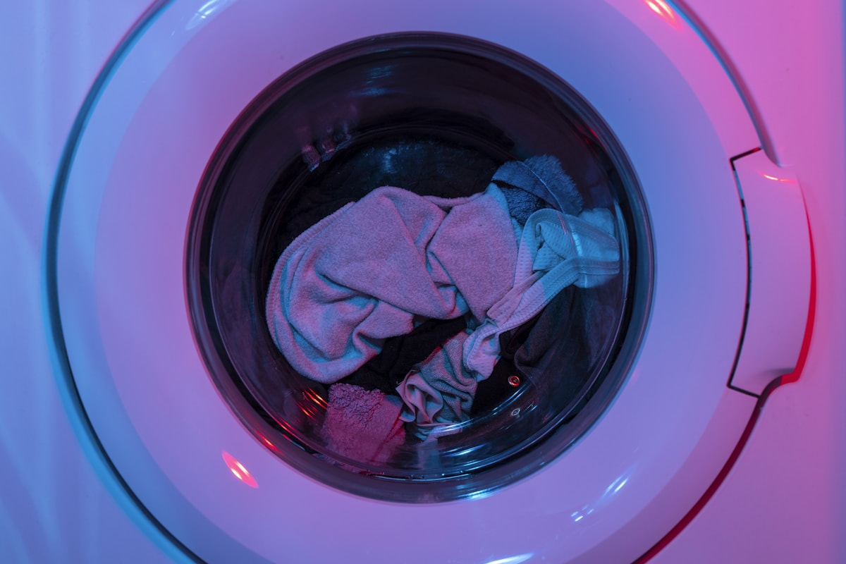 family ironing clothes laundry room
